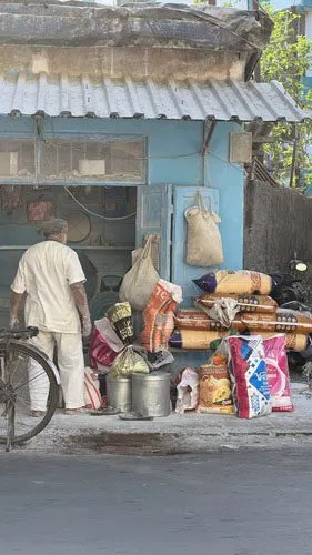 The Appetite of a City — artisanal flour bag vs atta chakki, two worlds. Photograph by Rini Singhi.